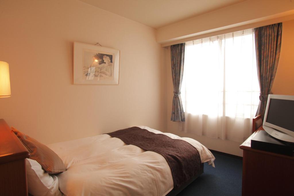 Hotel Sekumiya Obama  Camera foto